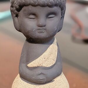 Tranquil Buddha Statue in Black and Tan